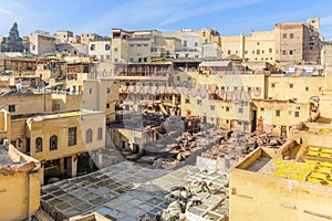 Leather dying in a traditional tannery in the city Fes, Morocco. View of old medina in Fes