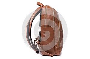 Leather female backpack sideways on a white background