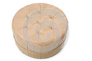 Leather footstool on white background