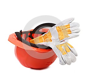 Leather gloves in hard hat.