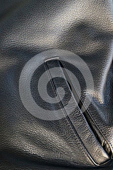 Leather jacket detail with pocket