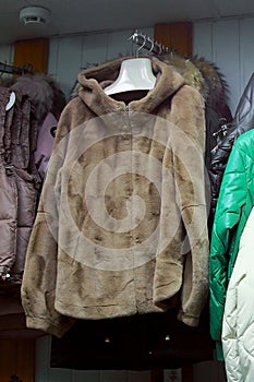 Leather Jackets on a mannequin in the store. Sheepskin coats.Fur coats are clothes for