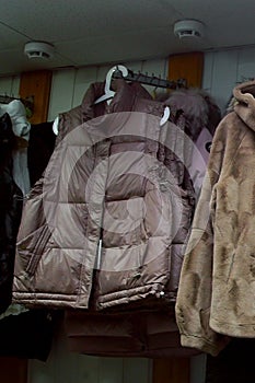 Leather Jackets on a mannequin in the store. Sheepskin coats.Fur coats are clothes for