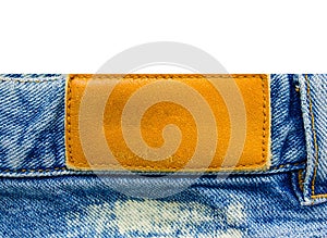 Leather label. jeans isolated white background.
