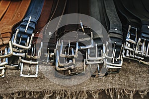 Leather man belts collection in the store.