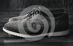 Leather Men`s Brogue Shoes on The Floor in Black & White