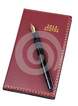 Leather notebook and pen isolated