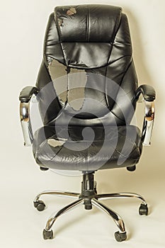 Leather office chair on a white background. no isolation. repairs. hauling upholstery