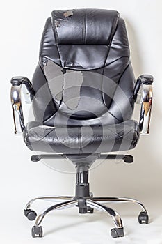 Leather office chair on a white background. no isolation. repairs. hauling upholstery