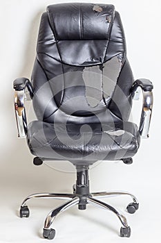 Leather office chair on a white background. no isolation. repairs. hauling upholstery