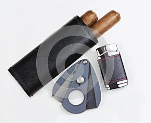 Leather pouch with two Cuban cigars, cutter and lighter