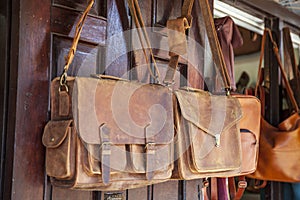 Leather purses, shoulder bags. Painted in different colors