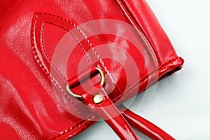 Leather red handbag closer photo
