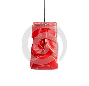 leather red right boxing glove hanging on a cord