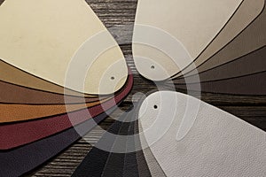 Leather samples on old wood table