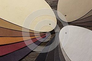 Leather samples on old wood table
