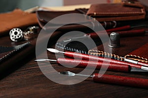 Leather samples and tools on table