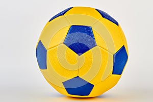 Leather soccer ball closeup image.