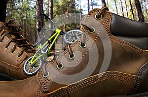 Leather travelling boots in woods