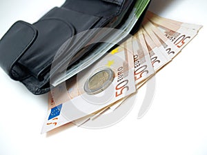 Leather wallet with euro money over white, isolated