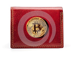 Leather wallet with golden bitcoin coin.