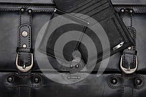 Leather wallets on the black background