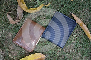 Leather wallets on the grass