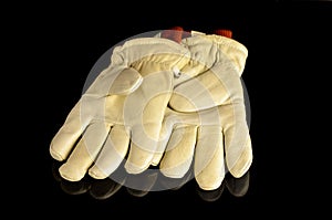 Leather work gloves on background