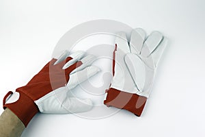 Leather work gloves on a white background