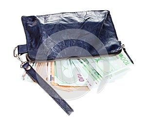 Leather wristlet purse with many euros isolated
