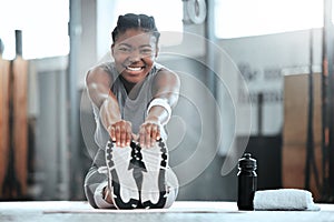 Leave regret to yesterday. Portrait of a young beautiful woman doing stretches and exercising at the gym.