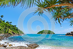 Leaves frame with Summer sea beach Amazing sea clear blue sky and clouds Wave crashing on seashore tree leaves beautiful leafs