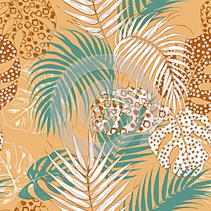 Leaves of the tropical palms with animal print seamless