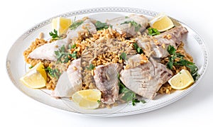 Lebanese fish rice and nuts serving dish