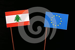 Lebanese flag with European Union EU flag on black