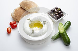 Lebanese food of Labneh Yogurt cheese with Olives and veggies