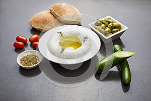 Lebanese food of Labneh Yogurt cheese with Olives and veggies