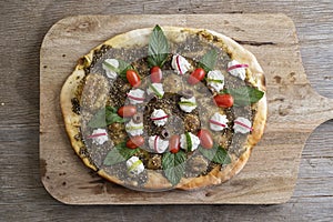 Lebanese Manoushe ,bread of thyme topped with mint,, Zaatar flat bread