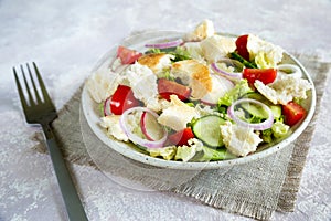 Lebanese salad fattoush. Healthy vegetarian food. Traditional lebanon salad with toasted pita bread and vegetables
