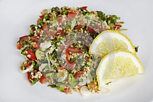 Lebanese Tabbouleh with lemon slices