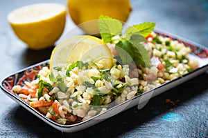 Lebanese tabbouleh salad with bulgur, parsley, tomato and cucmber