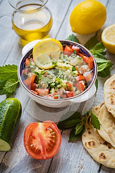 Lebanese tabbouleh salad with bulgur, parsley, tomato and cucmber