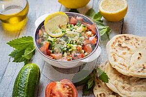 Lebanese tabbouleh salad with bulgur, parsley, tomato and cucmber