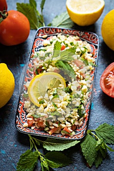 Lebanese tabbouleh salad with bulgur, parsley, tomato and cucmber