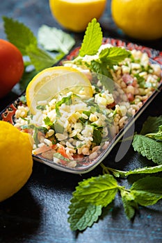 Lebanese tabbouleh salad with bulgur, parsley, tomato and cucmber