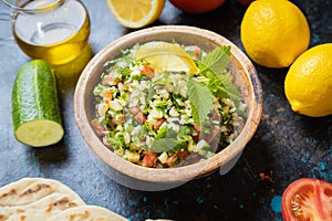 Lebanese tabbouleh salad with bulgur, parsley, tomato and cucmber