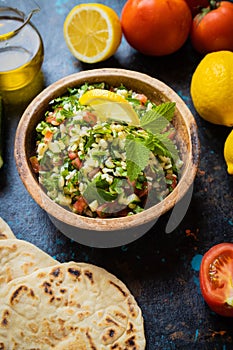 Lebanese tabbouleh salad with bulgur, parsley, tomato and cucmber