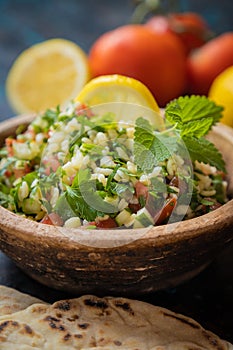 Lebanese tabbouleh salad with bulgur, parsley, tomato and cucmber