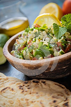 Lebanese tabbouleh salad with bulgur, parsley, tomato and cucmber