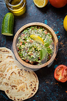 Lebanese tabbouleh salad with bulgur, parsley, tomato and cucmber